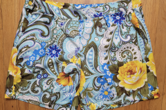 A pair of shorts that proved I can kind of sew but definitely not count, because they're easily 6 inches too big for me to wear.